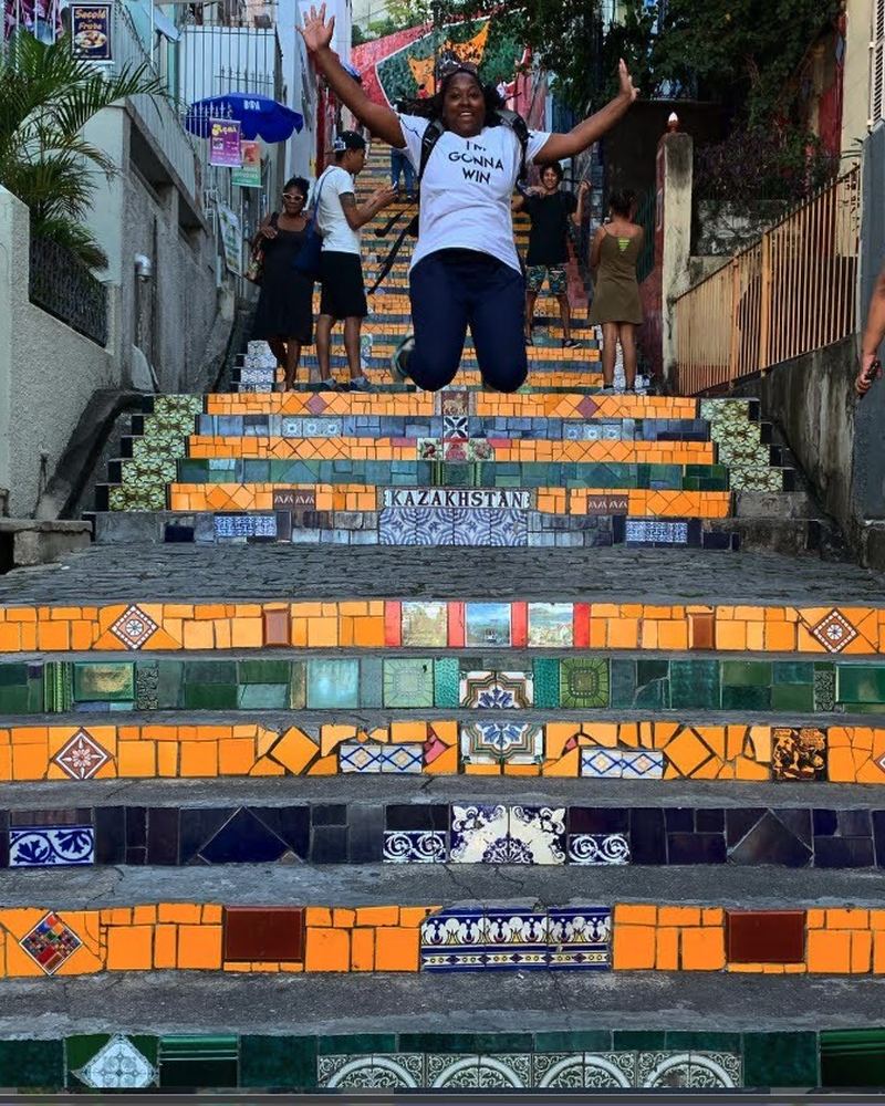 Valicia jumping on the tiled Selarón Steps